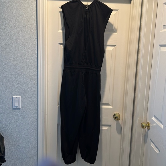 Black Sleeveless Jumpsuit Key Hole Back Pockets, Drawstring, Jogger Legs NWT - Picture 3 of 8